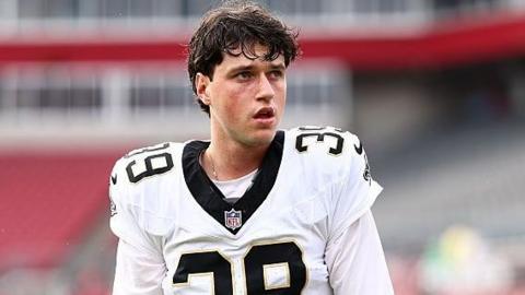 Charlie Smyth in New Orleans Saints NFL outfit