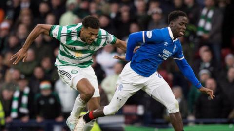 Celtic's Auston Trysty vies with Rangers' Djeidi Gassama