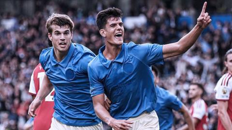 Brighton's Chema Andres celebrates scoring against Arsenal