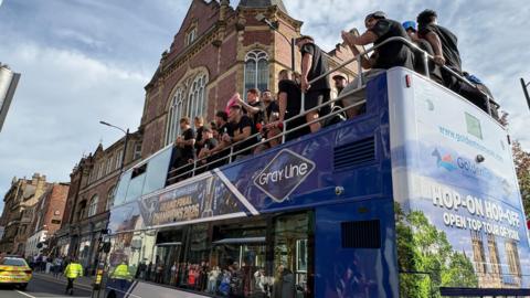 Wakefield Trinity players on an open-top bus