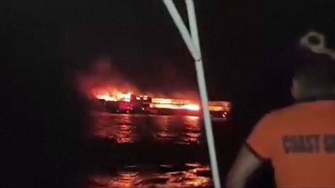 Burning boat in Philippines