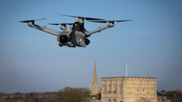 A Police drone flying across Norwich with the castle in the background