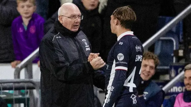 Falkirk manager John McGlynn congratulates Owen Eames