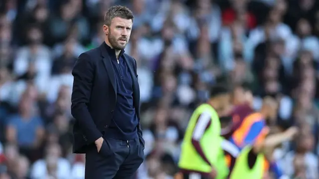 Michael Carrick, Manager / Head Coach of Manchester United looks on