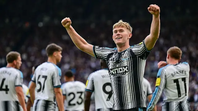 Lewis Hall of Newcastle United celebrates