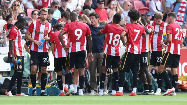Keith Andrews, Head Coach of Brentford talks to the players