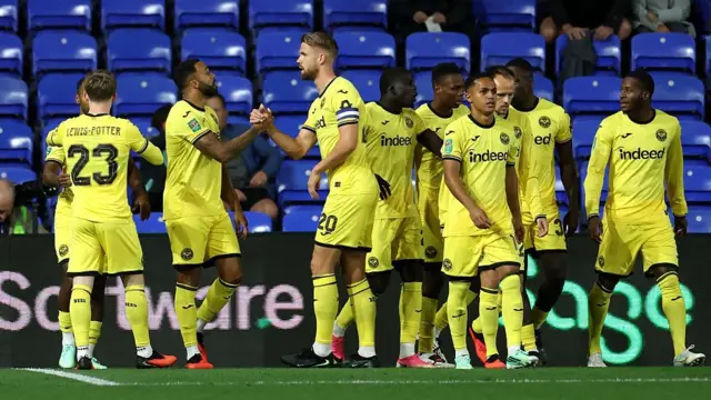 Callum Wilson of Brentford celebrates scoring his team’s first goal with teammates