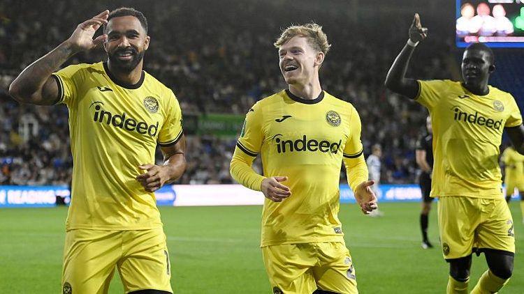 Callum Wilson, Keane Lewis-Potter and El Hadji Malick Diouf celebrating a goal for Brentford