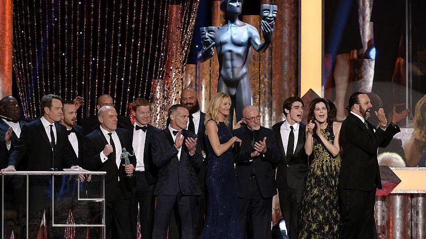 Actor Bryan Cranston (C) accepts the Outstanding Performance by an Ensemble in a Drama Series award for 'Breaking Bad' onstage during the 20th Annual Screen Actors Guild Awards at The Shrine Auditorium on January 18, 2014 in Los Angeles, California. (Photo by Kevork Djansezian/Getty Images)