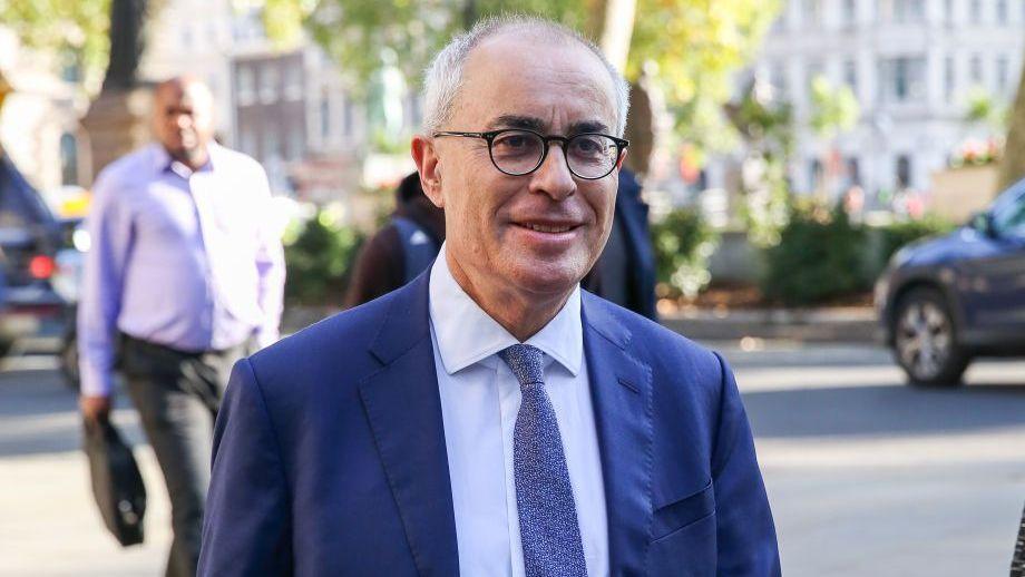Lord Pannick KC walking down the street