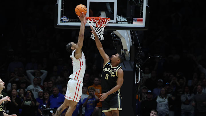 Uzan makes the winning basket in the final seconds of the Sweet 16 against Purdue. Uzan makes the winning basket in the final seconds of the Sweet 16 against Purdue.