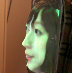 face LiveMask: A Telepresence Surrogate System with a Face-shaped Screen