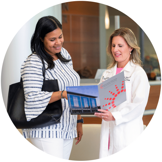 Image (6) Doctor showing pamphlet to patient