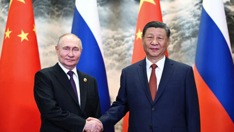 Russian President Vladimir Putin and Chinese President Xi Jinping meet in Beijing, China May 16, 2024, in this still image taken from live broadcast video. Kremlin.ru/Handout via REUTERS ATTENTION EDI