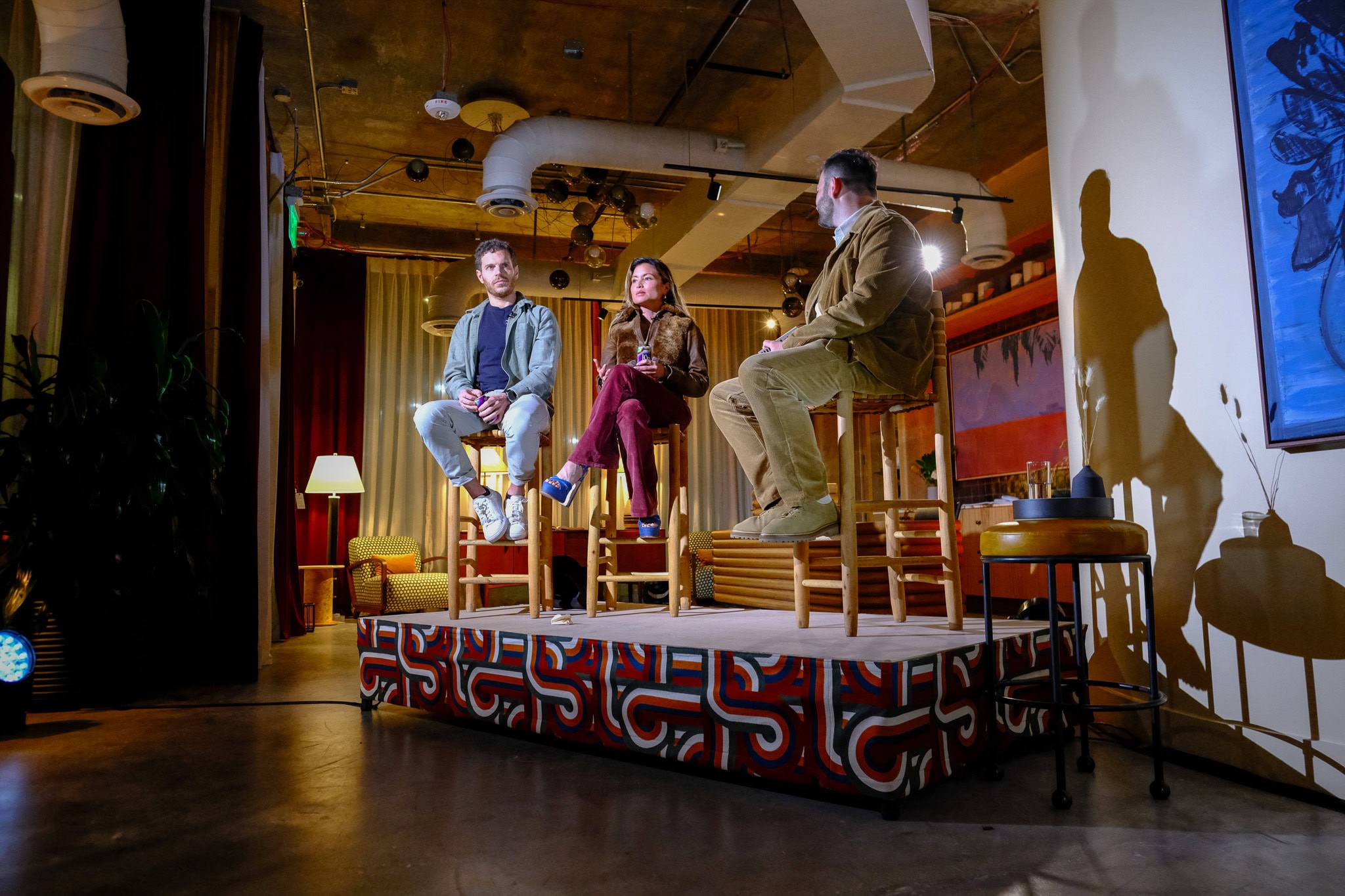 Live panel talk setup in private event space at The Malin with elevated stage