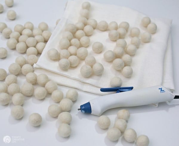 Supplies for making a DIY snowflake pillow