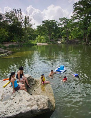Swimming Family Family swimming in a lake